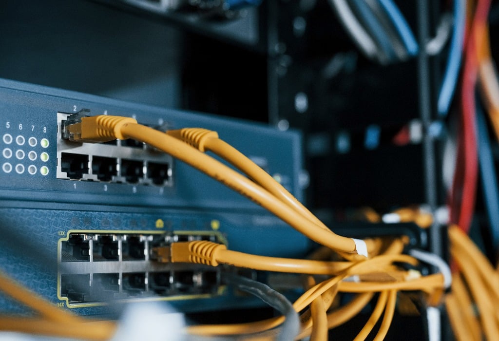 Close up view of internet equipment and cables in the server room